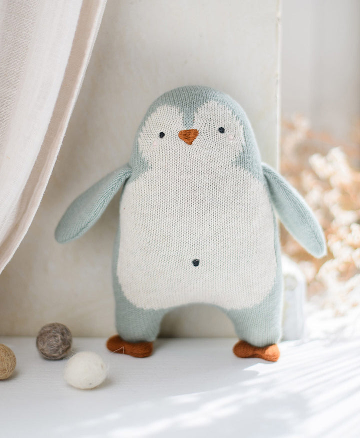 Babyrassel Pinguin - Creme, Hellblau, Orange